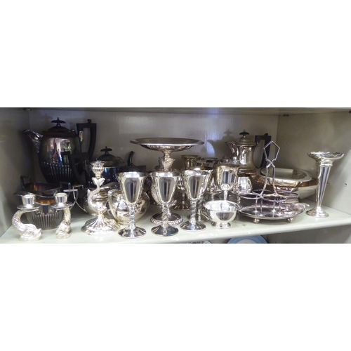 113 - Silver plated tableware: to include a Victorian style, four piece demi-reeded tea set