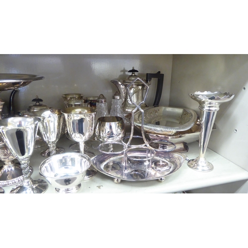 113 - Silver plated tableware: to include a Victorian style, four piece demi-reeded tea set