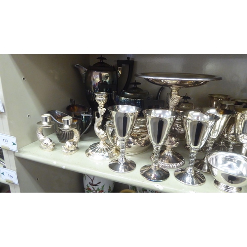 113 - Silver plated tableware: to include a Victorian style, four piece demi-reeded tea set