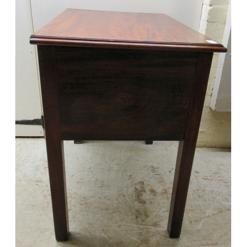 117 - An early 19th/late 20thC mahogany lowboy, the long shallow drawer and two box drawers with cockbeadi... 