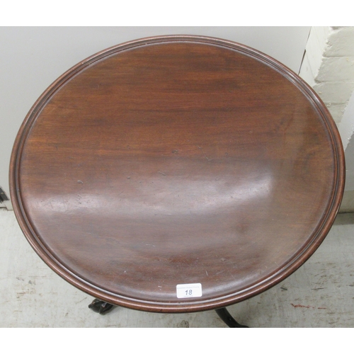 119 - A 19thC mahogany pedestal table, the turned top over a ring turned column with a foliate carved cabr... 