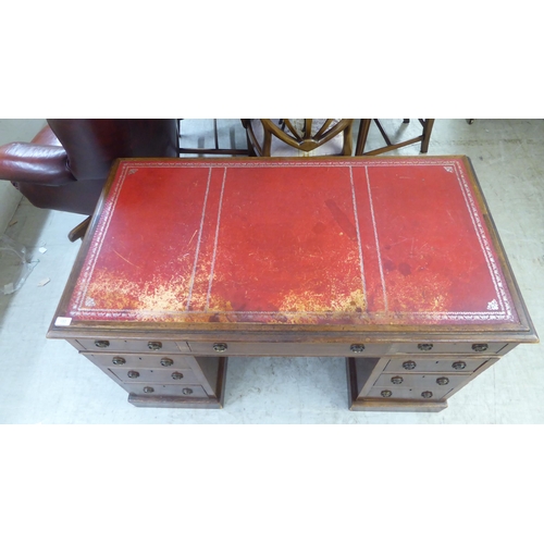 133 - A late Victorian mahogany nine drawer, twin pedestal desk  29