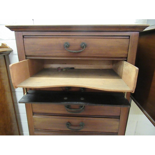 143 - A 1930s mahogany six drawer sheet music cabinet, raised on cabriole legs  34