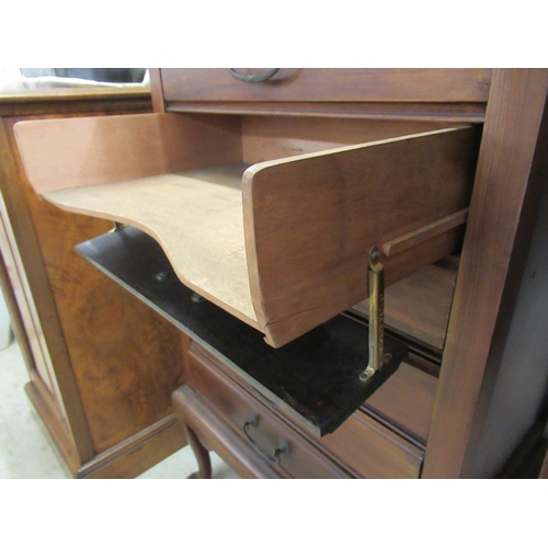 143 - A 1930s mahogany six drawer sheet music cabinet, raised on cabriole legs  34