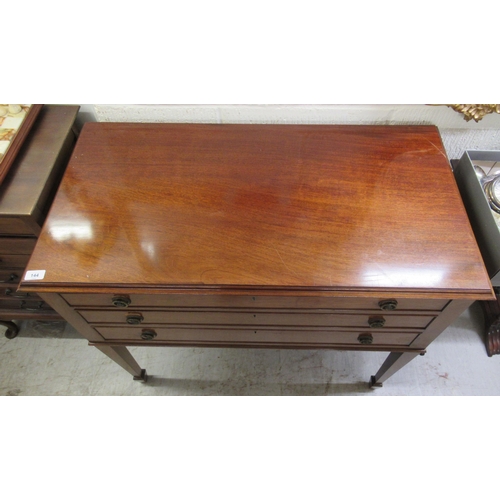 144 - An early 20thC mahogany three drawer serving table, raised on square, tapered legs and spade feet&nb... 