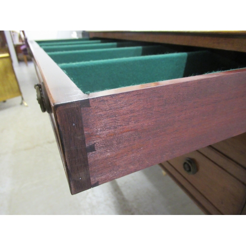 144 - An early 20thC mahogany three drawer serving table, raised on square, tapered legs and spade feet&nb... 