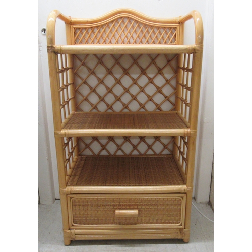 147 - A caned wicker three tier display unit with a base drawer  38