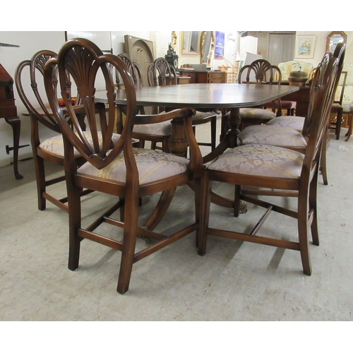 158 - A Regency style crossbanded mahogany twin pedestal dining table, raised on splayed legs  29