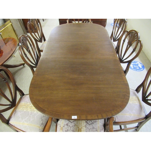 158 - A Regency style crossbanded mahogany twin pedestal dining table, raised on splayed legs  29