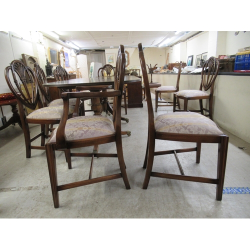 158 - A Regency style crossbanded mahogany twin pedestal dining table, raised on splayed legs  29