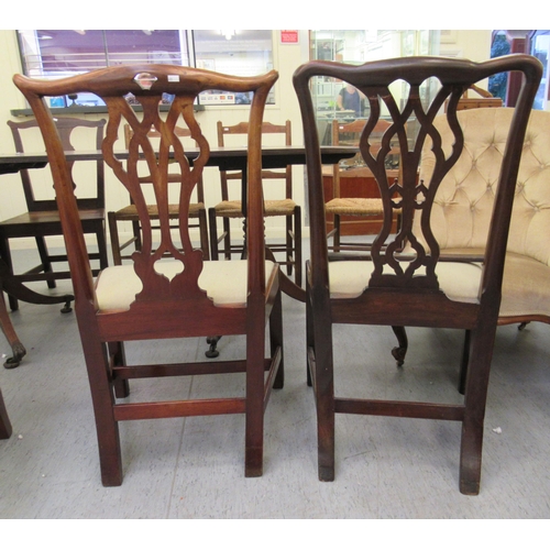 165 - Four early 20thC chairs: to include Chippendale design mahogany framed examples