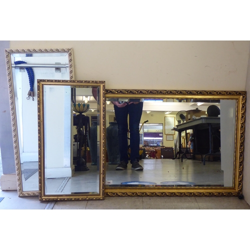 166 - Three modern mirrors, two in gilt frames  largest 20