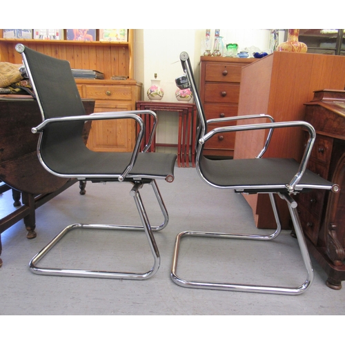 179 - A pair of modern chrome finished cantilever design chairs, each with a woven mesh material back and ... 