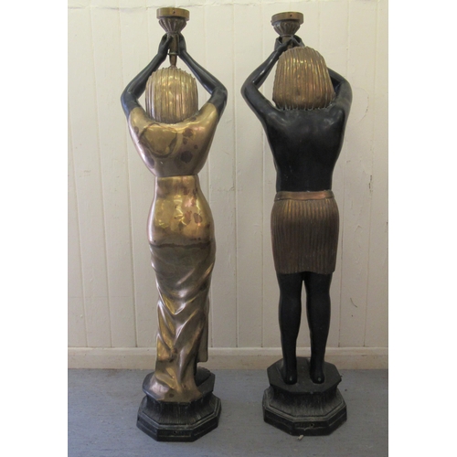 193 - A pair of 20thC bi-coloured bronze freestanding lamps, fashioned as ancient Egyptian figures, each h... 