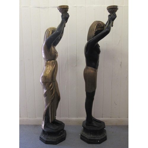 193 - A pair of 20thC bi-coloured bronze freestanding lamps, fashioned as ancient Egyptian figures, each h... 