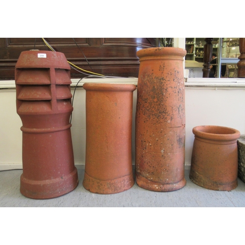 210 - Four dissimilar terracotta chimney pots  largest 30