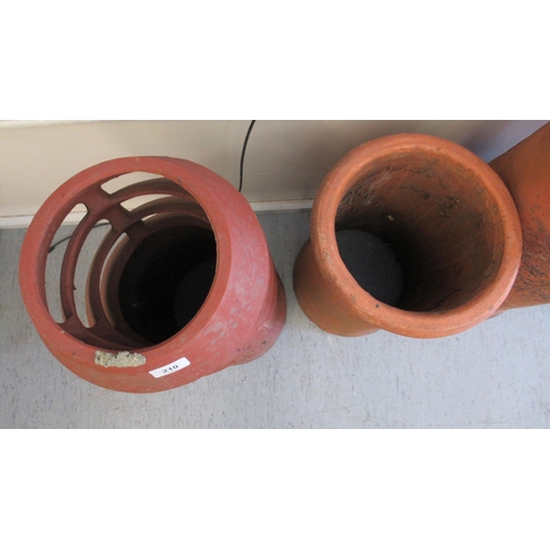 210 - Four dissimilar terracotta chimney pots  largest 30