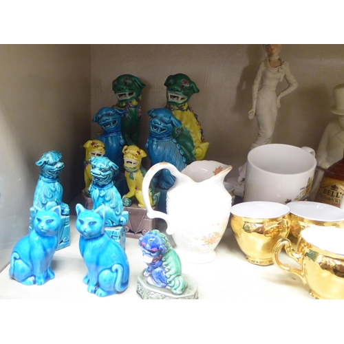 212 - Modern decorative ceramics: to include a pair of Chinese porcelain Dogs of Fo  largest 7