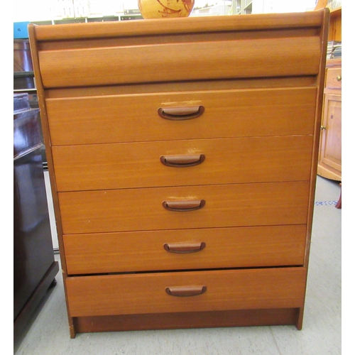 214 - A 1970s teak six drawer tallboy, on a plinth  39