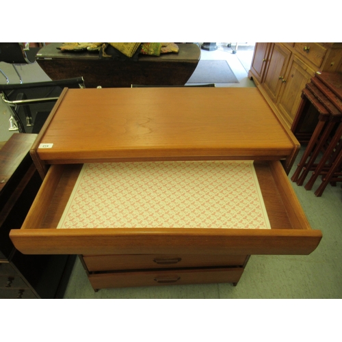 214 - A 1970s teak six drawer tallboy, on a plinth  39