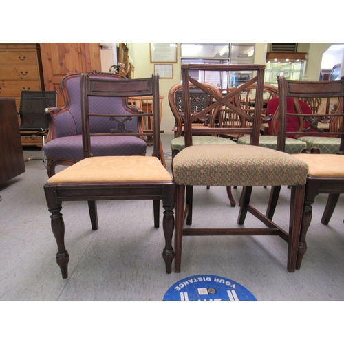 222 - Four dissimilar Regency mahogany framed dining chairs: to include a pair with crossover splats, rais... 