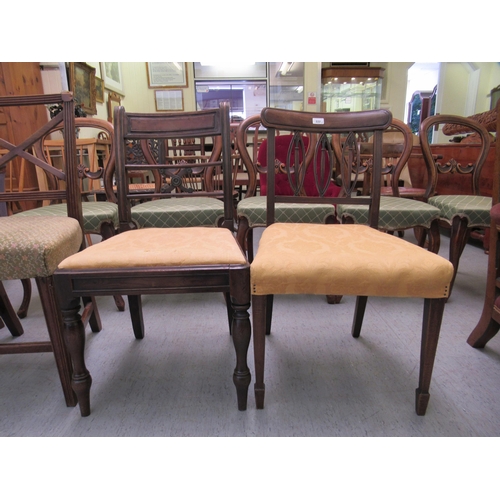 222 - Four dissimilar Regency mahogany framed dining chairs: to include a pair with crossover splats, rais... 