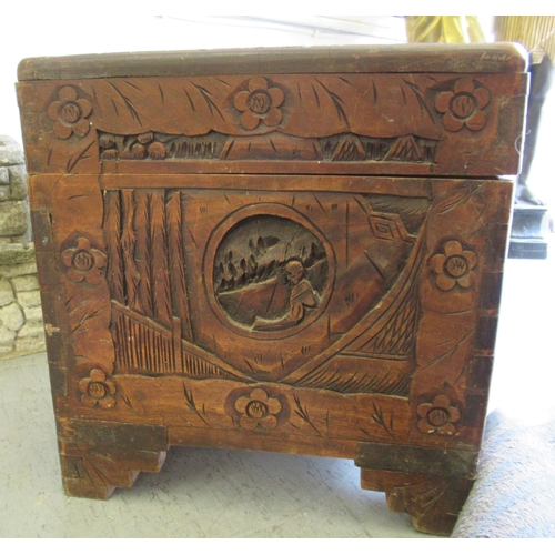 231 - A mid 20thC Chinese camphorwood chest, ornately carved with landscapes, raised on bracket feet  15