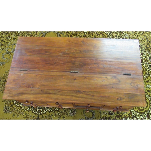 233 - A modern hardwood coffee table with a hinged lid, on a plinth  17