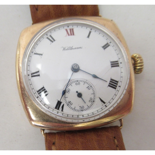 241 - A 1920s 9ct gold cased Waltham wristwatch, faced by an enamelled Roman dial