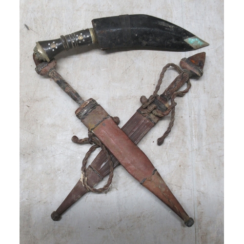 243 - 19th & mainly 20thC carved, wooden and other collectables: to include a Kukri, in a hide sheath;... 