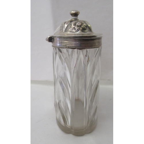 25 - An early Victorian silver lidded condiments pot with a moulded glass reservoir  George Frederic... 