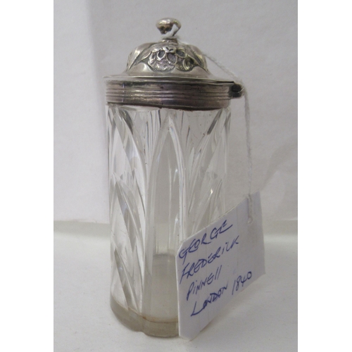 25 - An early Victorian silver lidded condiments pot with a moulded glass reservoir  George Frederic... 