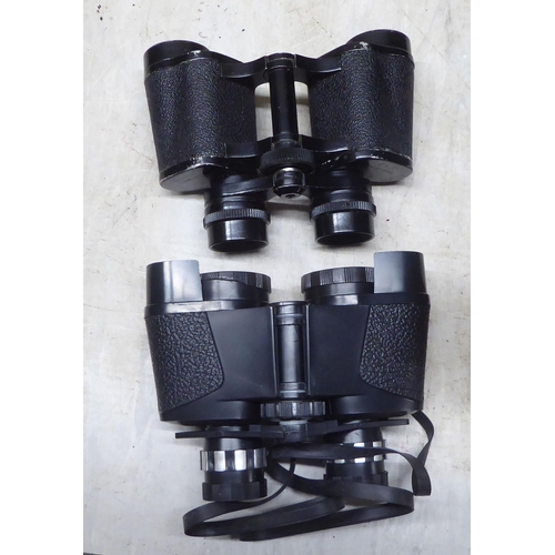 253 - Five pairs of binoculars: to include an American 10x60 example, in an early 20thC metal box  11... 