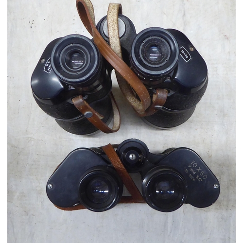 253 - Five pairs of binoculars: to include an American 10x60 example, in an early 20thC metal box  11... 