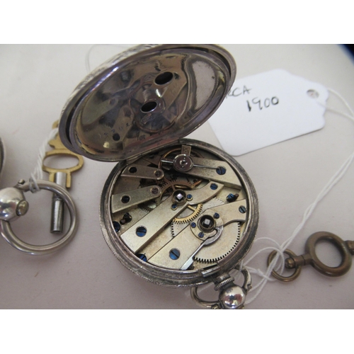 256 - Two silver pocket watches: to include an example by Jones & Co, faced by an enamelled Roman dial... 