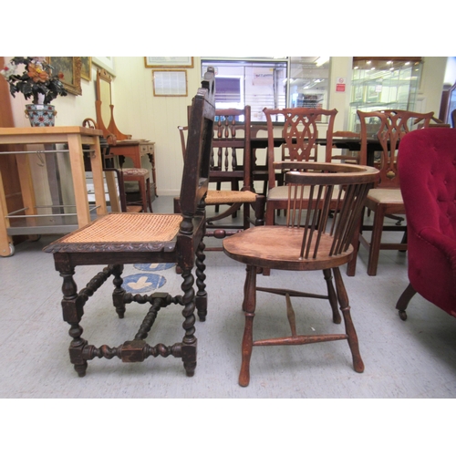 257 - A late Victorian stained and carved oak hall chair; and an early 20thC beech and mahogany framed exa... 