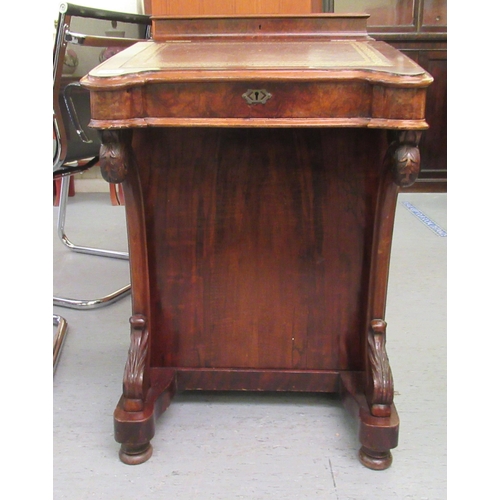 260 - A mid Victorian crossbanded mahogany and walnut Davenport with a hinged lidded compartment, over a t... 