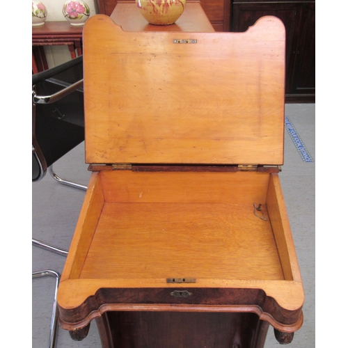 260 - A mid Victorian crossbanded mahogany and walnut Davenport with a hinged lidded compartment, over a t... 