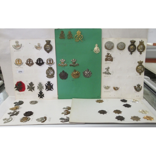 278 - Uncollated military cap badges, some copies: to include Middlesex regiment   (Please Note: this lot ... 