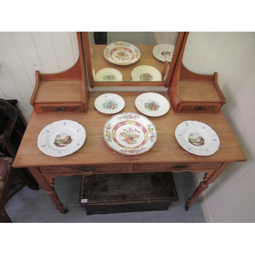 297 - An Edwardian bleached mahgoany and walnut finished dressing table, surmounted by a mirror, over an a... 