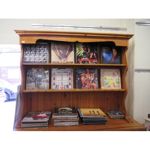 313 - A modern waxed pine dresser, the superstructure with two open plate rack shelves, over three frieze ... 