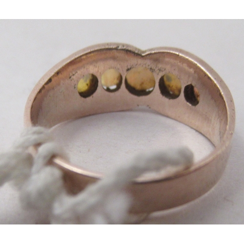 331 - A yellow metal ring, set with five graduated opals