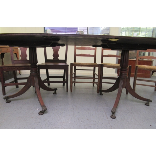 59 - A Regency mahogany twin pedestal dining table  31