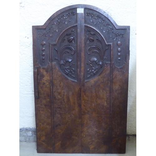 65 - Late 19th/early 20thC wooden architectural salvage: to include a carved pitch pine Gothic arch  24