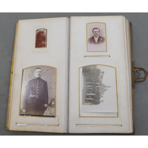 70 - A late Victorian leather bound carte de viste album, containing portraits