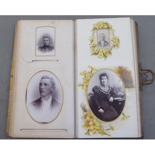 70 - A late Victorian leather bound carte de viste album, containing portraits