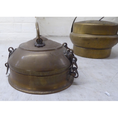 72 - Two Chinese cast metal food containers 