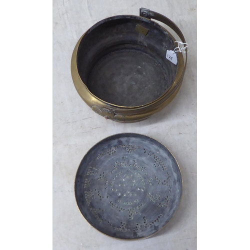 72 - Two Chinese cast metal food containers 