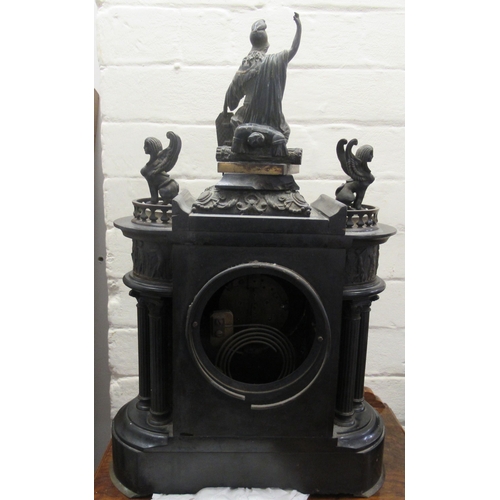 76 - A late Victorian black slate mantel clock of architectural form, surmounted by gilt metal figures; t... 