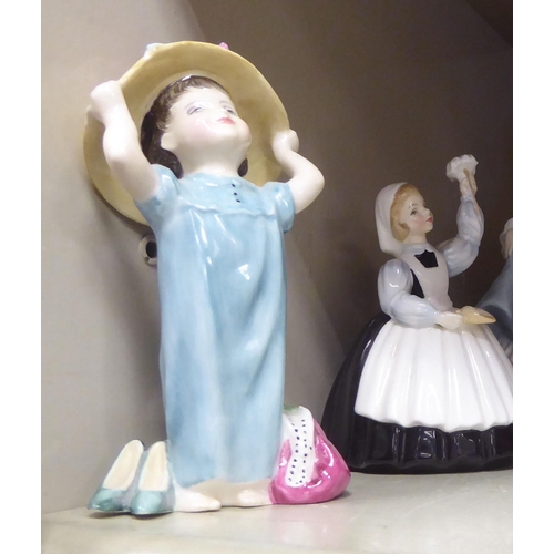 83 - Six ceramic figures: to include a Royal Doulton china figure 'Make Believe'  HN2225  5